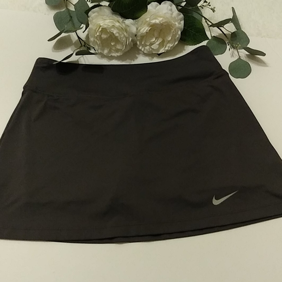 Nike Dresses & Skirts - Nike Dri-Fit Tennis/ gold skirt